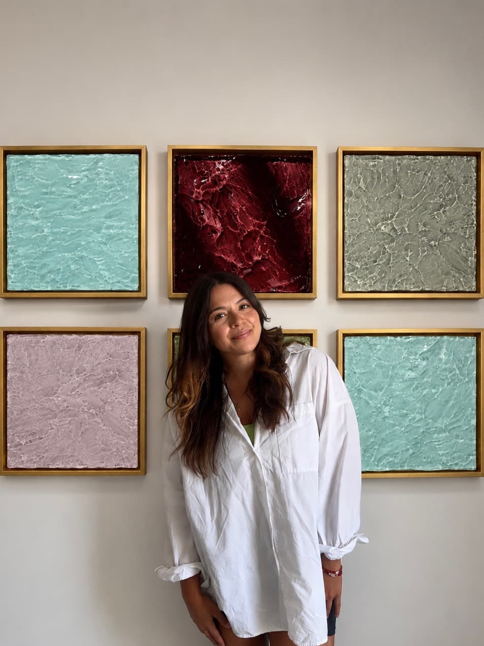 Anissa Martinez with her resin art collection